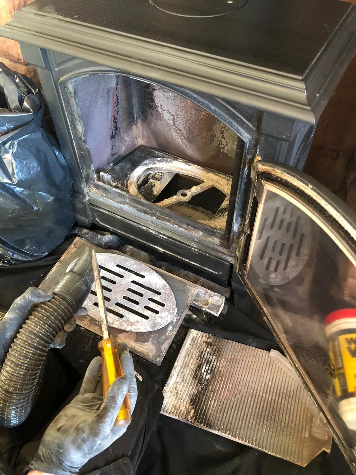 Stove baffle plates and grate removed during a full service